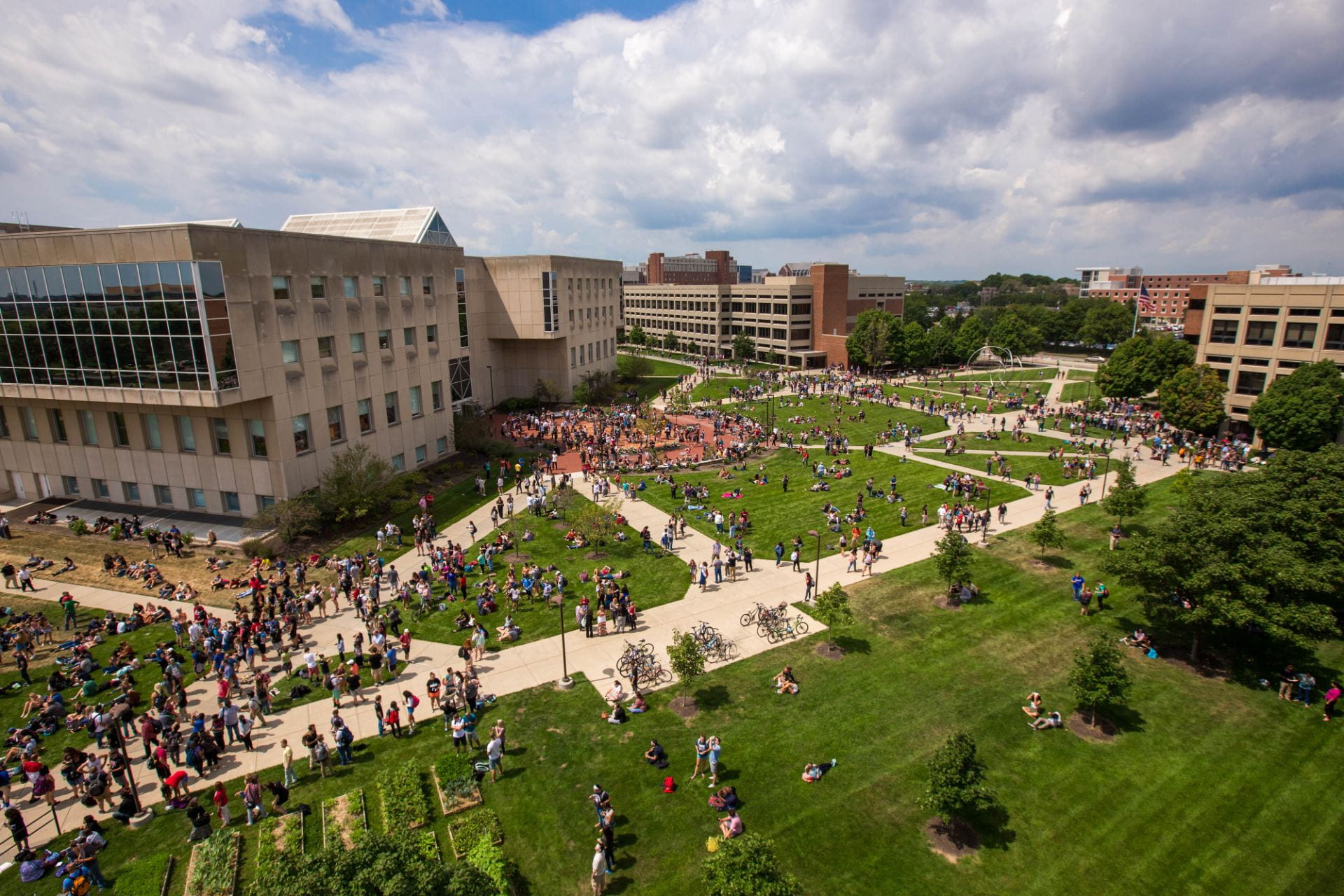 wide aerial shot of students walking around on campus.