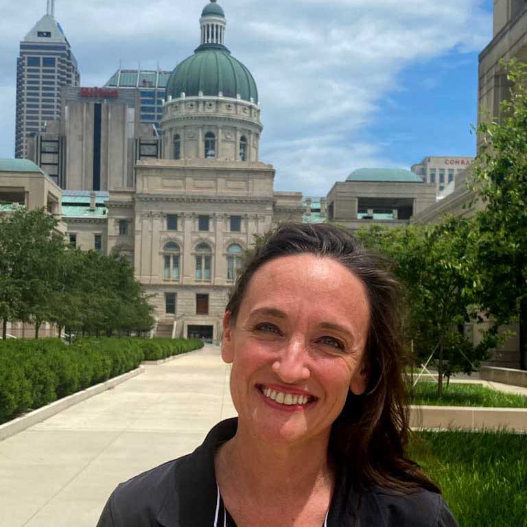 Jessica Kindig stands in front of the Indiana Statehouse